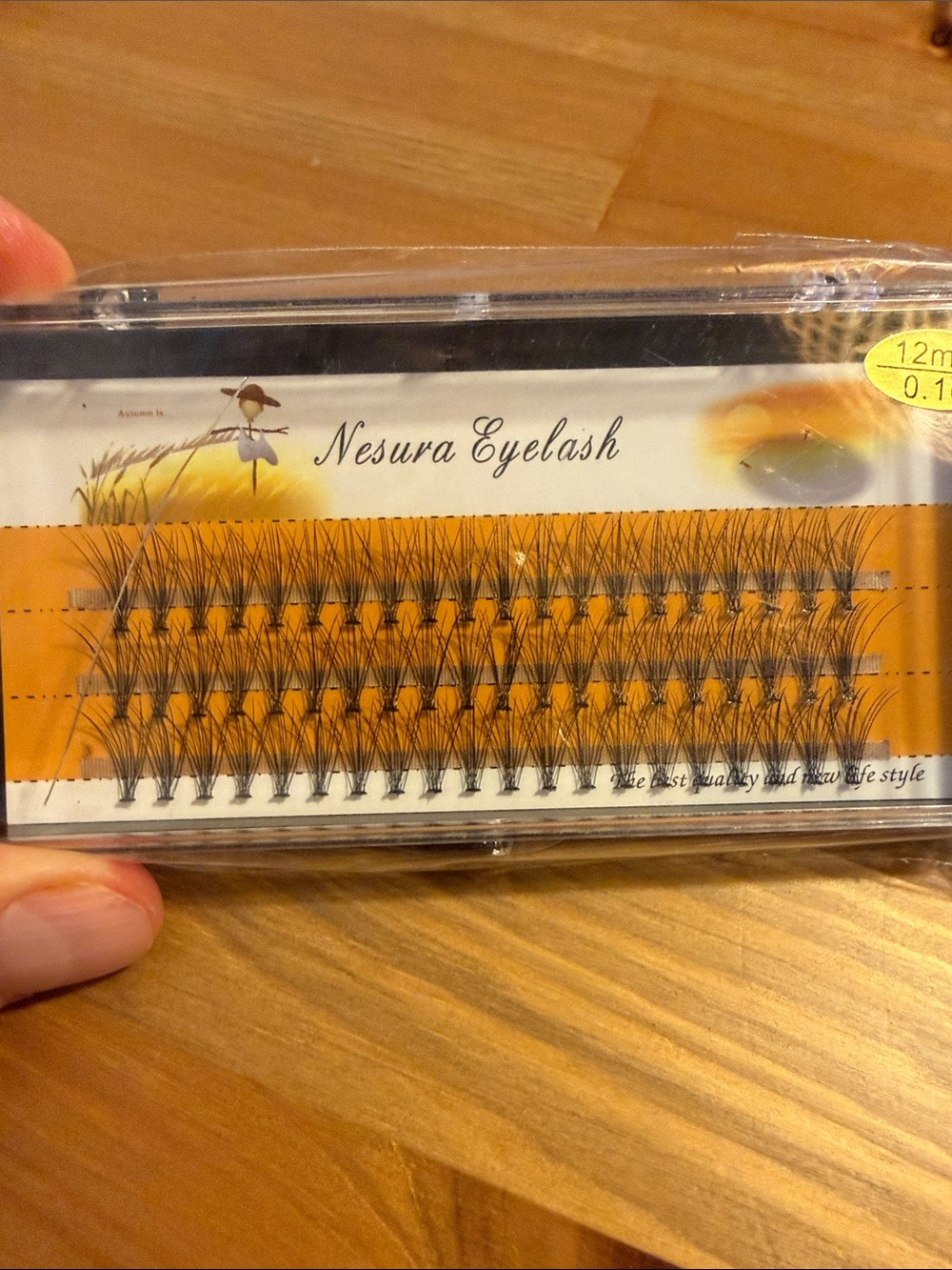 SHEIN Black Cluster False Eyelashes with Orange Accent Packaging